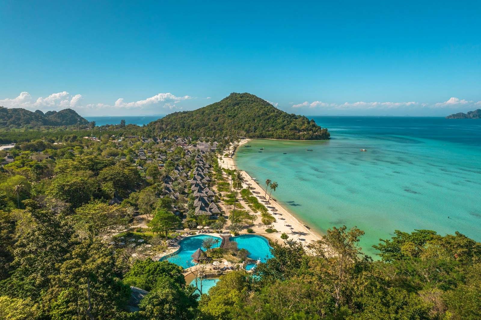 An aerial view of a tropical beach and lagoon